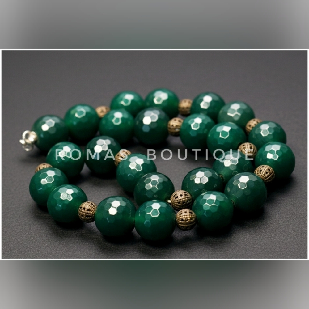 Green stone and silver tone necklace